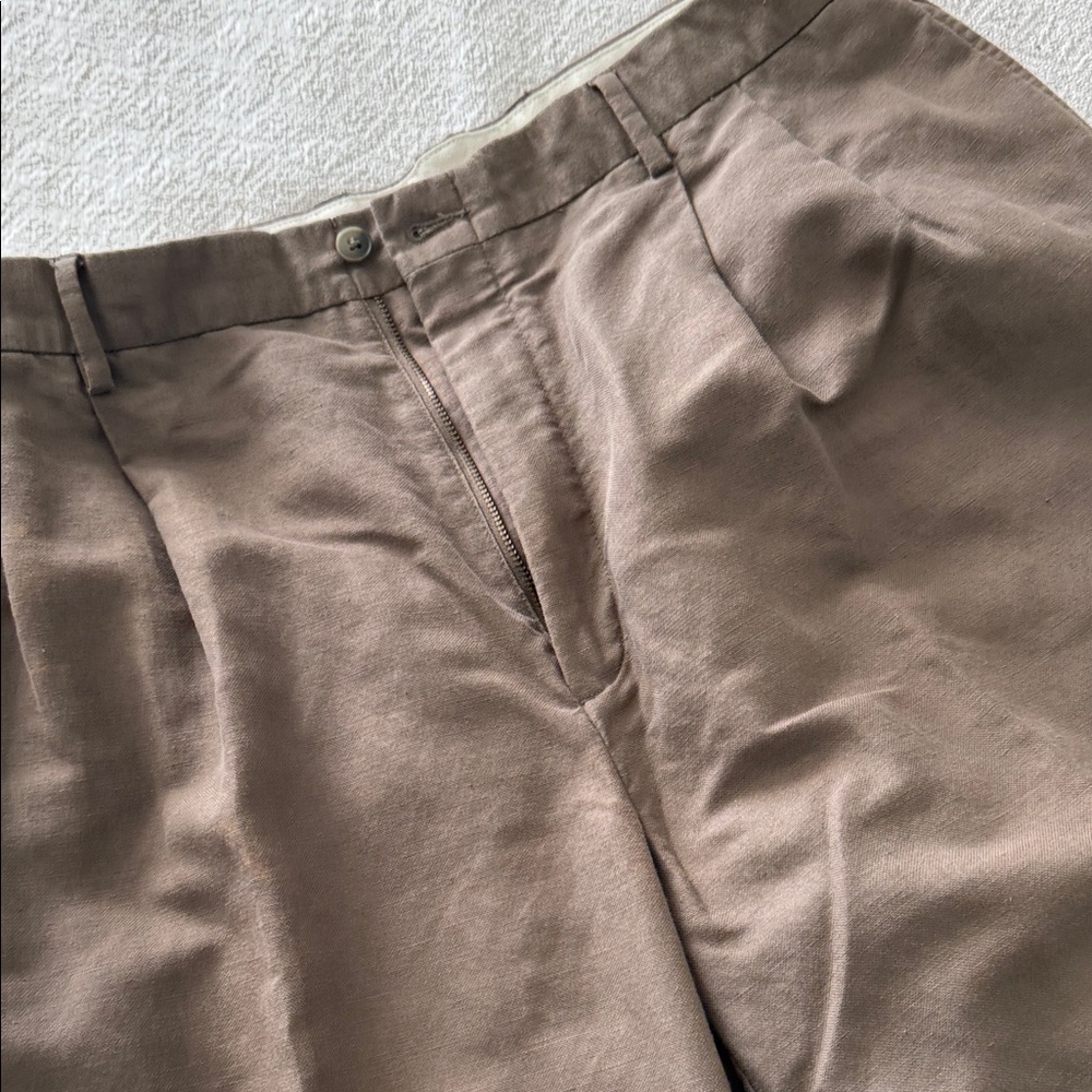 Relaxed Fit Khaki Pants with
Pleated front, slash pockets
